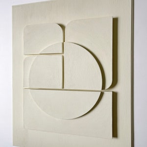 Textured and minimalist graphic wall piece. Modern monochromatic shapes. Minimalist style decor. Art sculpture.