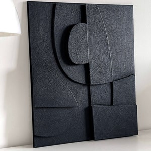 Textured and minimalist graphic wall piece. Modern monochromatic shapes. Minimalist style decor. Art sculpture.