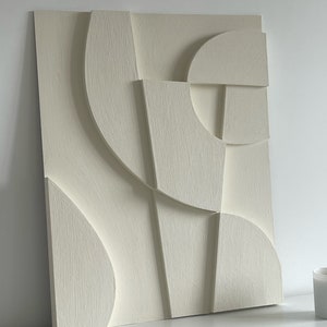 Textured and minimalist graphic wall piece. Modern monochromatic shapes. Minimalist style decor. Art sculpture.