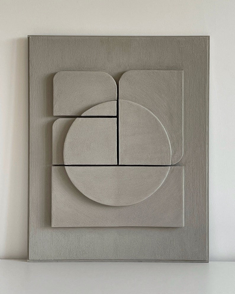 Textured and minimalist graphic wall piece. Modern monochromatic shapes. Minimalist style decor. Art sculpture.