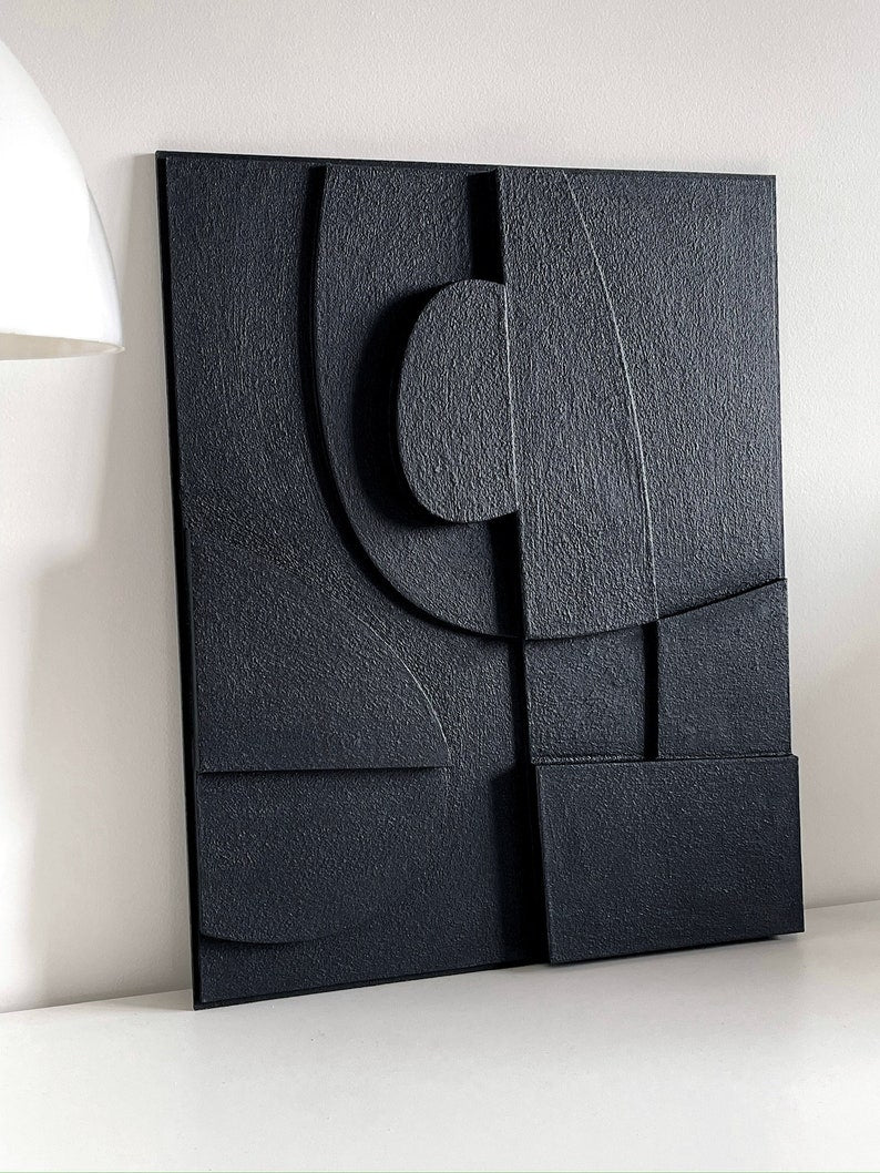 Textured and minimalist graphic wall piece. Modern monochromatic shapes. Minimalist style decor. Art sculpture.