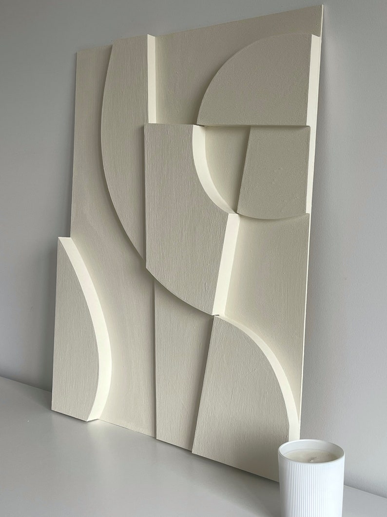 Textured and minimalist graphic wall piece. Modern monochromatic shapes. Minimalist style decor. Art sculpture.