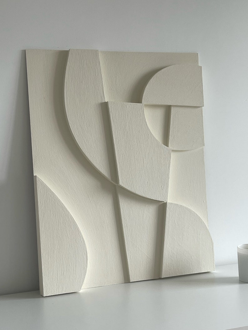 Textured and minimalist graphic wall piece. Modern monochromatic shapes. Minimalist style decor. Art sculpture.