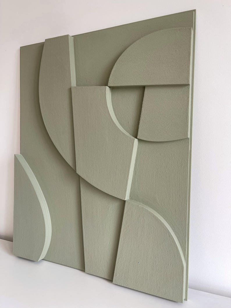 Textured and minimalist graphic wall piece. Modern monochromatic shapes. Minimalist style decor. Art sculpture.