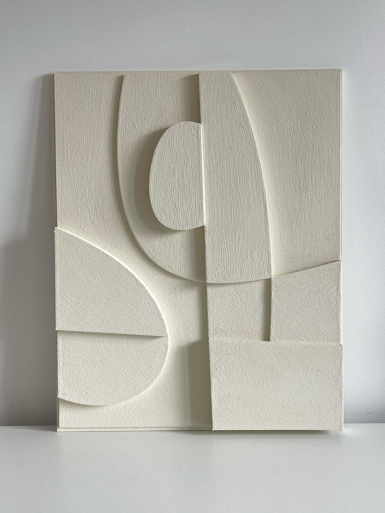 Textured and minimalist graphic wall piece. Modern monochromatic shapes. Minimalist style decor. Art sculpture.